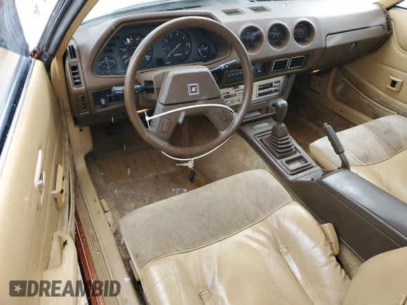 1982 Datsun 280ZX 2+2 z VIN JN1HZ06S8CX435431, wystawiony jako Copart lot #44468595 z przebiegiem 41 956 mil mil oraz Tytuł czysty. Historia ofert i sprzedaży dostępna na DreamBid. Obrazek 8.