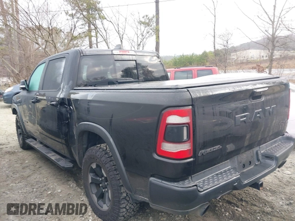 2019 Ram 1500 Rebel with VIN 1C6SRFLTXKN580782, listed as a IAAI auction lot 41498027 with 83,669 mi miles and . Bid and sale history available at DreamBid. Image 13.