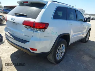 2021 Jeep Grand Cherokee Laredo E with VIN 1C4RJFAG5MC579865, listed as a IAAI auction lot 41818874 with 105,489 mi miles and . Bid and sale history available at DreamBid. Image 4.