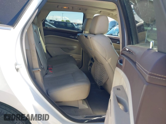 2011 Cadillac SRX Turbo Premium Collection with VIN 3GYFNKE68BS532056, listed as a IAAI auction lot 42447059 with 104,969 mi miles and . Bid and sale history available at DreamBid. Image 8.