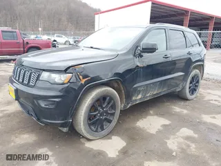 2018 Jeep Grand Cherokee Laredo E with VIN 1C4RJFAG3JC324434, listed as a IAAI auction lot 41812311 with 140,820 mi miles. Bid and sale history available at carsss.com. Image 17.