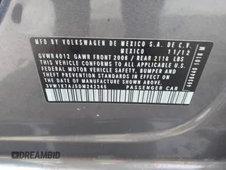 2013 Volkswagen Jetta S z VIN 3VW1K7AJ5DM242345, wystawiony jako IAAI lot #42598698 z przebiegiem 169 870 mil mil oraz . Historia ofert i sprzedaży dostępna na DreamBid. Obrazek 9.