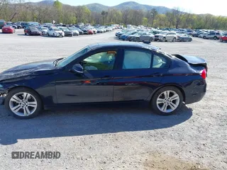 2016 BMW 3 Series 328i with VIN WBA8E9G55GNT83275, listed as a IAAI auction lot 42056215 with 102,904 mi miles and . Bid and sale history available at DreamBid. Image 13.