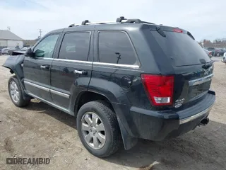 2010 Jeep Grand Cherokee Limited with VIN 1J4RR5GT8AC101758, listed as a IAAI auction lot 41824380 with 118,944 mi miles. Bid and sale history available at carsss.com. Image 3.