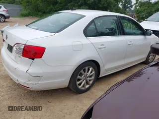 2014 Volkswagen Jetta SE with VIN 3VWD17AJ0EM371501, listed as a IAAI auction lot 42597170 with 166,686 mi miles and . Bid and sale history available at DreamBid. Image 4.
