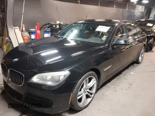 2014 BMW 7 Series ALPINA B7 xDrive with VIN WBAYF8C53ED141858, listed as a IAAI auction lot 40987098 with 128,404 mi miles and . Bid and sale history available at DreamBid. Image 2.