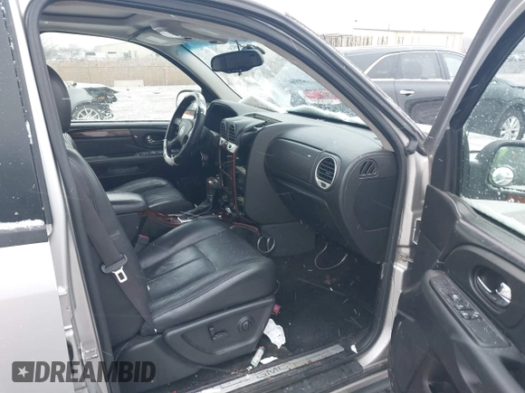 2005 GMC Envoy SLT with VIN 1GKDT13S352258640, listed as a IAAI auction lot 41226997 with 159,665 mi miles. Bid and sale history available at carsss.com. Image 5.