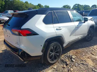 2023 Toyota RAV4 Hybrid XSE with VIN 2T3E6RFV1PW038080, listed as a IAAI auction lot 42518107 with 14,430 mi miles and . Bid and sale history available at DreamBid. Image 4.
