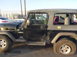 2005 Jeep Wrangler Unlimited with VIN 1J4FA44S35P314941, listed as a IAAI auction lot 41278276 with 248,865 mi miles. Bid and sale history available at carsss.com. Image 13.