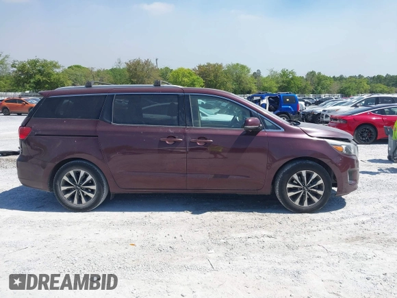 2015 Kia Sedona EX with VIN KNDMC5C19F6018139, listed as a IAAI auction lot 42031165 with 136,484 mi miles. Bid and sale history available at carsss.com. Image 13.