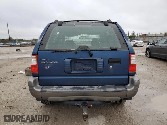 2002 Isuzu Rodeo S с VIN 4S2CK58W624340508, выставлен на аукционе Copart как лот 87872745 с пробегом 144 432 миль миль и Списание • Salvage title. История ставок и продаж доступна на DreamBid. Изображение 6.