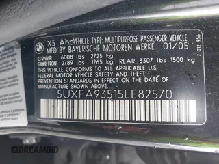 2005 BMW X5 4.8is with VIN 5UXFA93515LE82570, listed as a IAAI auction lot 41759657 with 212,687 mi miles. Bid and sale history available at carsss.com. Image 9.