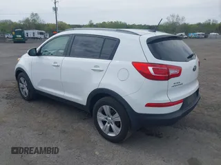 2013 Kia Sportage LX with VIN KNDPB3A20D7499468, listed as a IAAI auction lot 42090424 with 241,104 mi miles. Bid and sale history available at carsss.com. Image 3.