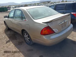 2002 Toyota Avalon XL with VIN 4T1BF28BX2U236851, listed as a IAAI auction lot 41566661 with 260,124 mi miles and . Bid and sale history available at DreamBid. Image 3.