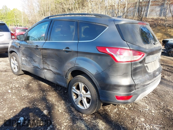 2015 Ford Escape SE with VIN 1FMCU9GX6FUB35649, listed as a IAAI auction lot 42055398 with 128,524 mi miles. Bid and sale history available at carsss.com. Image 3.
