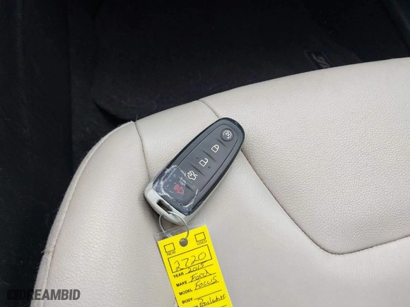 2015 Ford Focus Titanium with VIN 1FADP3N23FL293432, listed as a IAAI auction lot 41929774 with 100,865 mi miles. Bid and sale history available at carsss.com. Image 11.