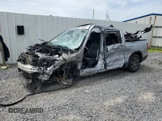2020 Honda Ridgeline RTL-E with VIN 5FPYK3F70LB003853, listed as a Copart auction lot 56938085 with Not provided miles and Salvage title. Bid and sale history available at DreamBid. Image 1.