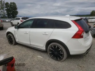 2018 Volvo V60 z VIN YV440MWK1J2051771, wystawiony jako Copart lot #67960674 z przebiegiem 49 782 mil mil oraz Szkoda całkowita • Salvage title. Historia ofert i sprzedaży dostępna na DreamBid. Obrazek 2.
