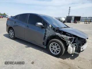 2020 Toyota Prius L Eco z VIN JTDKARFU9L3105675, wystawiony jako Copart lot #54587165 z przebiegiem 130 560 mil mil oraz Szkoda całkowita • Salvage title. Historia ofert i sprzedaży dostępna na DreamBid. Obrazek 4.