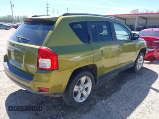 2012 Jeep Compass Latitude with VIN 1C4NJCEB9CD688401, listed as a IAAI auction lot 41801282 with 154,059 mi miles and . Bid and sale history available at carsss.com. Image 4.