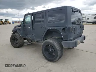 2015 Jeep Wrangler Unlimited Wrangler X with VIN 1C4HJWEG7FL649231, listed as a Copart auction lot 47972905 with 133,895 mi miles and Salvage title. Bid and sale history available at DreamBid. Image 2.