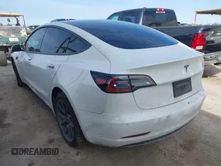 2019 Tesla Model 3 Mid Range with VIN 5YJ3E1EA6KF464615, listed as a IAAI auction lot 41306600 with 79,478 mi miles and . Bid and sale history available at DreamBid. Image 3.