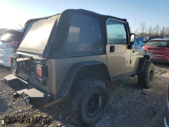 2004 Jeep Wrangler Rubicon with VIN 1J4FA69S94P778836, listed as a Copart auction lot 82884304 with 168,045 mi miles and Salvage Title. Bid and sale history available at carsss.com. Image 3.