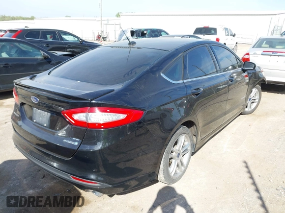 2016 Ford Fusion SE Hybrid с VIN 3FA6P0LU4GR204062, выставлен на аукционе IAAI как лот 42041634 с пробегом 138 876 миль миль и . История ставок и продаж доступна на DreamBid. Изображение 4.