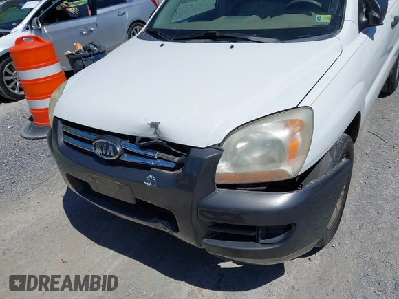 2006 Kia Sportage LX with VIN KNDJF723567151614, listed as a IAAI auction lot 42022102 with 128,564 mi miles and . Bid and sale history available at carsss.com. Image 6.