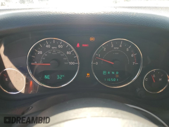 2012 Jeep Wrangler Unlimited Sport with VIN 1C4BJWDG0CL200802, listed as a Copart auction lot 63822365 with 116,501 mi miles and Salvage title. Bid and sale history available at DreamBid. Image 9.