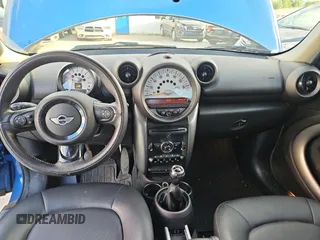 2012 MINI Countryman z VIN WMWZB3C50CWM30636, wystawiony jako Copart lot #58615615 z przebiegiem 123 289 mil mil oraz Tytuł czysty. Historia ofert i sprzedaży dostępna na DreamBid. Obrazek 9.