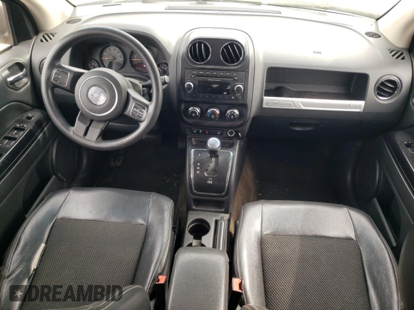 2014 Jeep Compass Altitude with VIN 1C4NJCBA8ED730183, listed as a Copart auction lot 73128034 with 76,993 mi miles and Salvage Title. Bid and sale history available at carsss.com. Image 8.