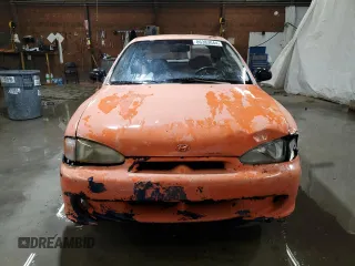 1997 Hyundai Accent z VIN KMHVD14NXVU221266, wystawiony jako Copart lot #86383044 z przebiegiem 159 517 mil mil oraz Szkody całkowita. Historia ofert i sprzedaży dostępna na DreamBid. Obrazek 5.