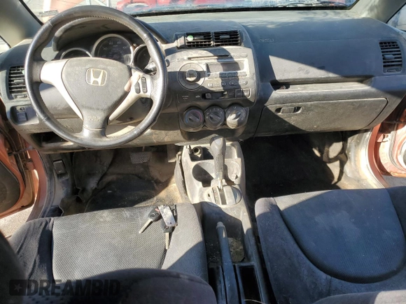 2007 Honda Fit Sport with VIN JHMGD38637S038204, listed as a Copart auction lot 84936024 with 199,066 mi miles and Salvage title. Bid and sale history available at DreamBid. Image 8.