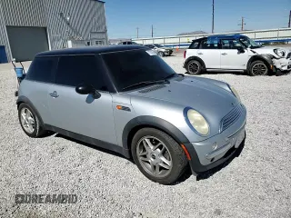 2002 MINI Hardtop with VIN WMWRC33472TC34281, listed as a Copart auction lot 71631644 with 196,947 mi miles and Salvage Title. Bid and sale history available at DreamBid. Image 11.