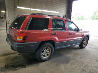 2004 Jeep Grand Cherokee Laredo with VIN 1J4GW48S04C164745, listed as a Copart auction lot 64036725 with 163,054 mi miles and Salvage title. Bid and sale history available at DreamBid. Image 3.