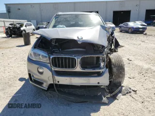 2016 BMW X5 xDrive35i z VIN 5UXKR0C51G0P30210, wystawiony jako Copart lot #49525235 z przebiegiem Nie podano mil oraz Szkoda całkowita • Salvage title. Historia ofert i sprzedaży dostępna na DreamBid. Obrazek 5.
