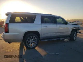 2019 Chevrolet Suburban LT with VIN 1GNSCJKC7KR149136, listed as a Copart auction lot 72937124 with 56,750 mi miles and Clean Title. Bid and sale history available at carsss.com. Image 3.