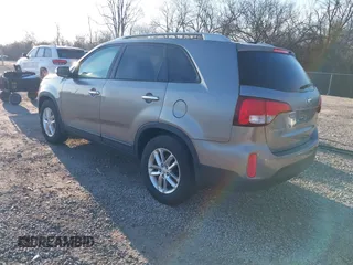 2014 Kia Sorento LX with VIN 5XYKT3A63EG503284, listed as a IAAI auction lot 41814383 with 166,219 mi miles and . Bid and sale history available at DreamBid. Image 3.