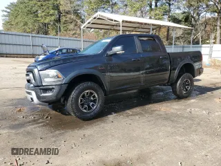 2017 Ram 1500 Rebel z VIN 1C6RR6YT7HS523912, wystawiony jako Copart lot #83148244 z przebiegiem Nie podano mil oraz Szkoda całkowita • Salvage title. Historia ofert i sprzedaży dostępna na DreamBid. Obrazek 1.