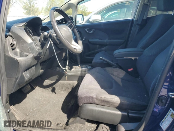 2013 Honda Fit Sport with VIN JHMGE8H57DC072654, listed as a Copart auction lot 48356135 with 82,557 mi miles and Salvage Title. Bid and sale history available at carsss.com. Image 7.