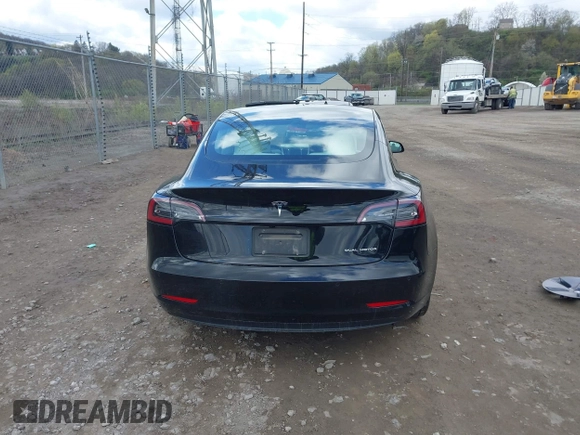 2021 Tesla Model 3 Long Range with VIN 5YJ3E1EB7MF052988, listed as a IAAI auction lot 42052662 with 29,877 mi miles and . Bid and sale history available at carsss.com. Image 16.