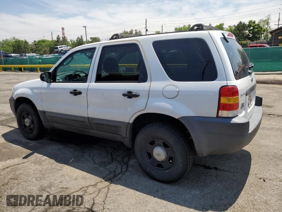 2004 Ford Escape XLS with VIN 1FMCU92114DA15564, listed as a Copart auction lot 59358015 with 186,135 mi miles and Salvage title. Bid and sale history available at DreamBid. Image 2.