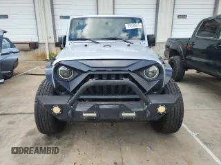 2016 Jeep Wrangler Unlimited Sahara with VIN 1C4BJWEG6GL168944, listed as a Copart auction lot 61650615 with 66,016 mi miles and Salvage title. Bid and sale history available at DreamBid. Image 5.