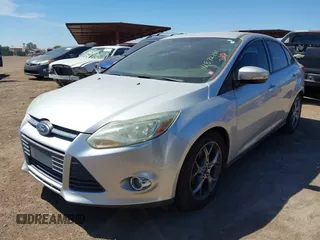 2014 Ford Focus SE with VIN 1FADP3F25EL199002, listed as a IAAI auction lot 41872781 with 150,548 mi miles. Bid and sale history available at carsss.com. Image 2.
