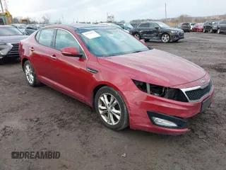 2013 Kia Optima EX z VIN 5XXGN4A78DG141924, wystawiony jako IAAI lot #41474952 z przebiegiem 172 814 mil mil oraz . Historia ofert i sprzedaży dostępna na DreamBid. Obrazek 1.