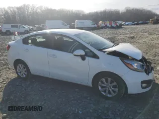 2014 Kia Rio EX z VIN KNADN4A39E6375275, wystawiony jako Copart lot #47278305 z przebiegiem 101 571 mil mil oraz Szkoda całkowita • Salvage title. Historia ofert i sprzedaży dostępna na DreamBid. Obrazek 4.