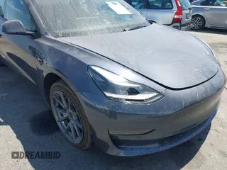 2023 Tesla Model 3 Long Range with VIN 5YJ3E1EB6PF682747, listed as a IAAI auction lot 41980506 with 32,541 mi miles and . Bid and sale history available at DreamBid. Image 6.