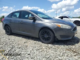 2016 Ford Focus SE with VIN 1FADP3F29GL233719, listed as a Copart auction lot 56857705 with 140,785 mi miles and Salvage title. Bid and sale history available at DreamBid. Image 4.