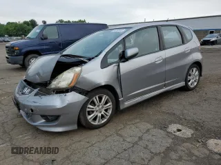 2010 Honda Fit Sport with VIN JHMGE8H47AC005068, listed as a Copart auction lot 64360465 with 161,012 mi miles and Salvage title. Bid and sale history available at DreamBid. Image 1.